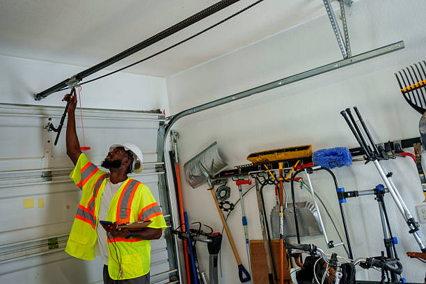 Professional Garage Door Panel Replacement technician working in Fincastle, TN